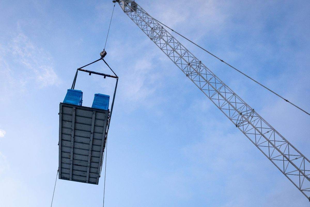 HVAC Equipment being lifted to the 10th story rooftop.